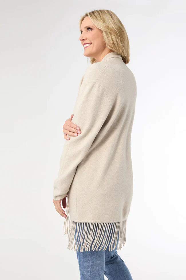 Soft mid-length cardigan with fringe hem, open front, long sleeves, and cozy pockets.