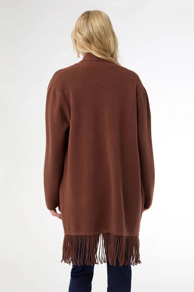 Soft mid-length cardigan with fringe hem, open front, long sleeves, and cozy pockets.