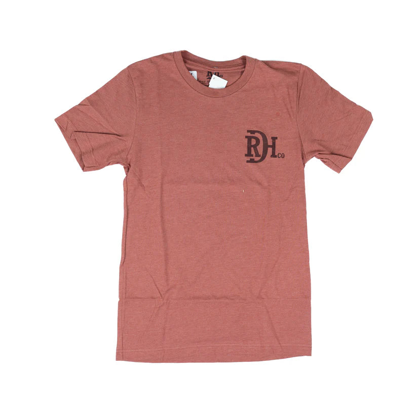 Red Dirt Hat Co. Sunset Peak tee in rust with RDH chest logo and mountain sunset back graphic