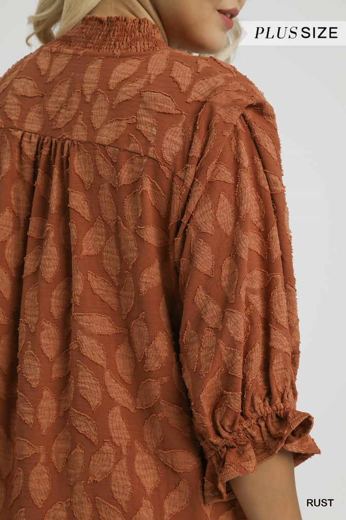 Back view of Floral Jacquard V-Neck Top with textured pattern