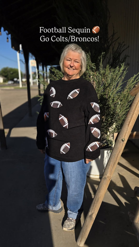 Black corded crew sweatshirt with sequin footballs front view