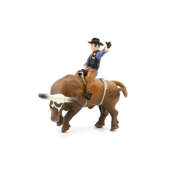 Little Buster Toys bucking bull with cowboy rider in mid-ride position