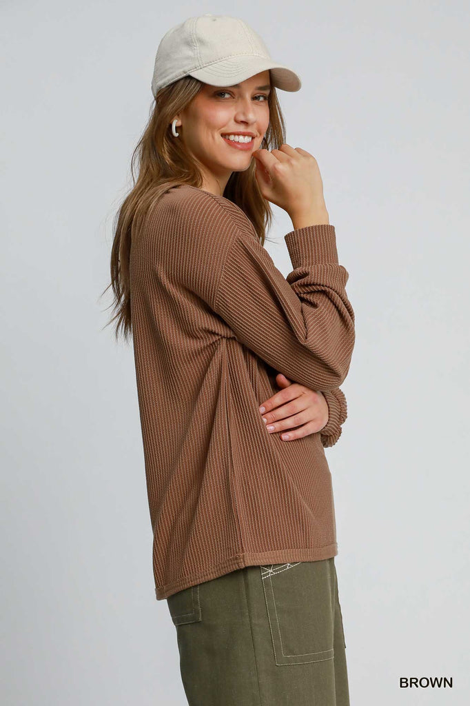 Women’s brown knit shirt in textured fabric with long sleeves

