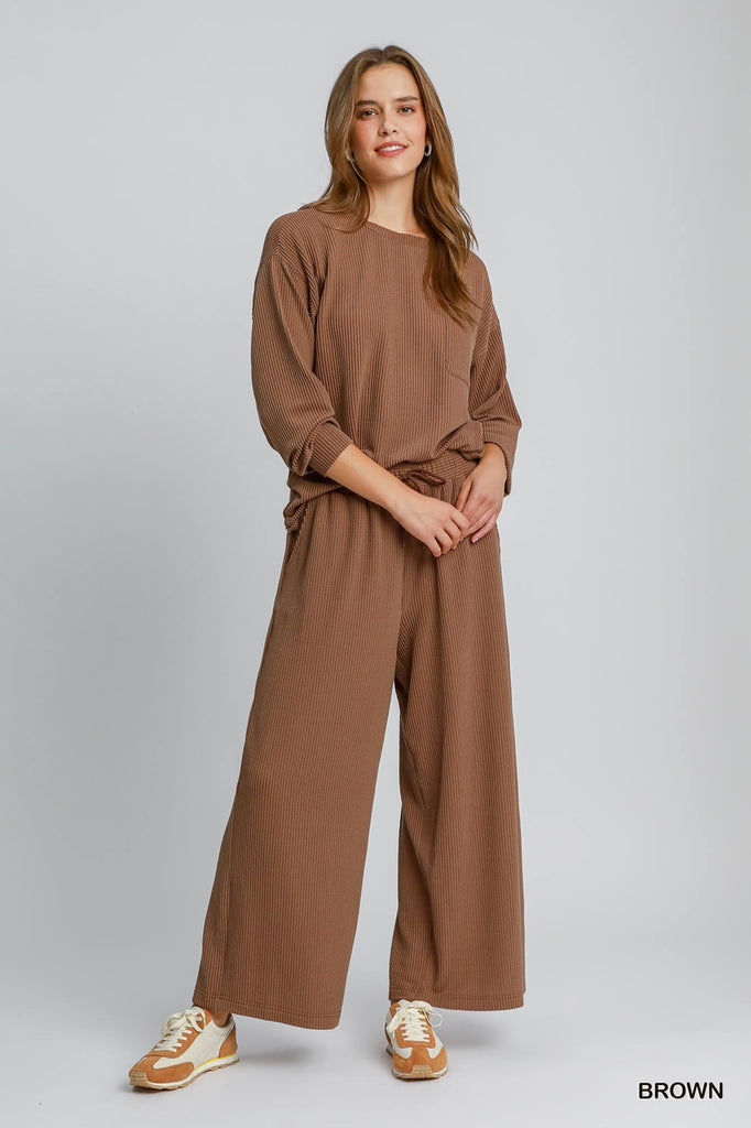 Soft knit brown long sleeve shirt with front pocket and matching pants available

