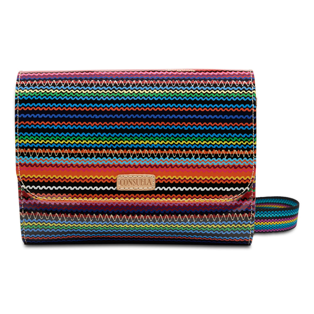 “Consuela Reese On The Town Bag in bold Reese stripe pattern with woven crossbody strap 