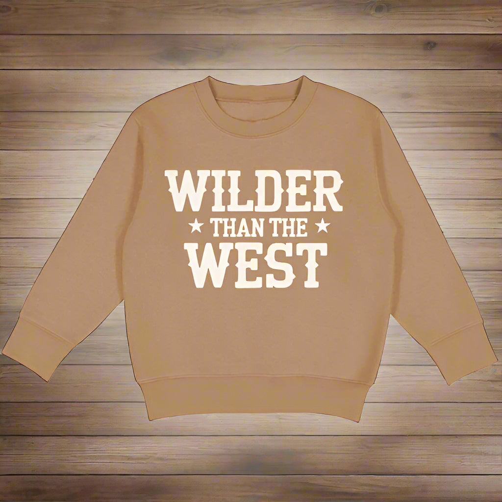 Brown sweatshirt with 'Wilder Than The West' text on a white background
