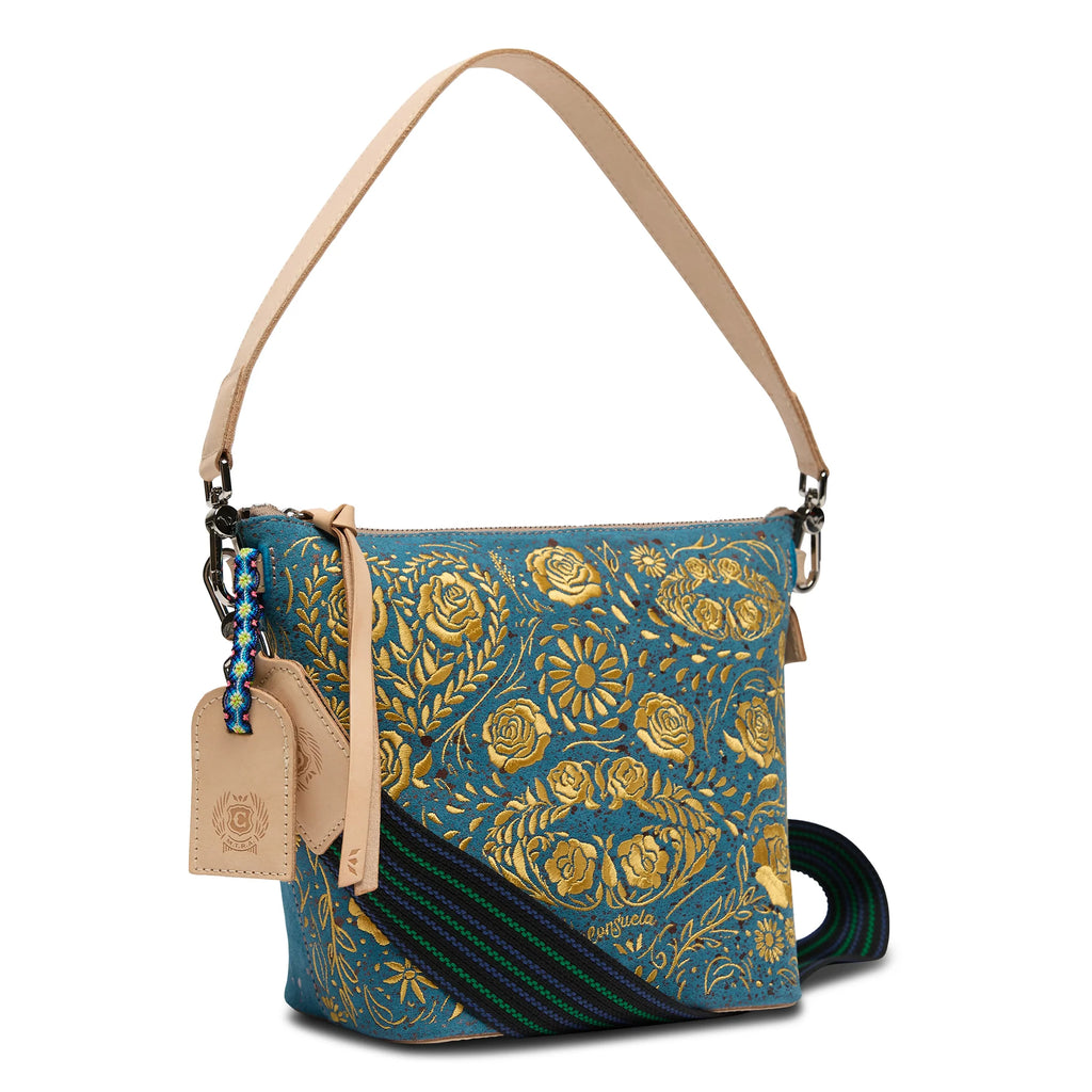 Consuela Shiloh Wedge bag with embroidered floral suede and bronze metallic accents.