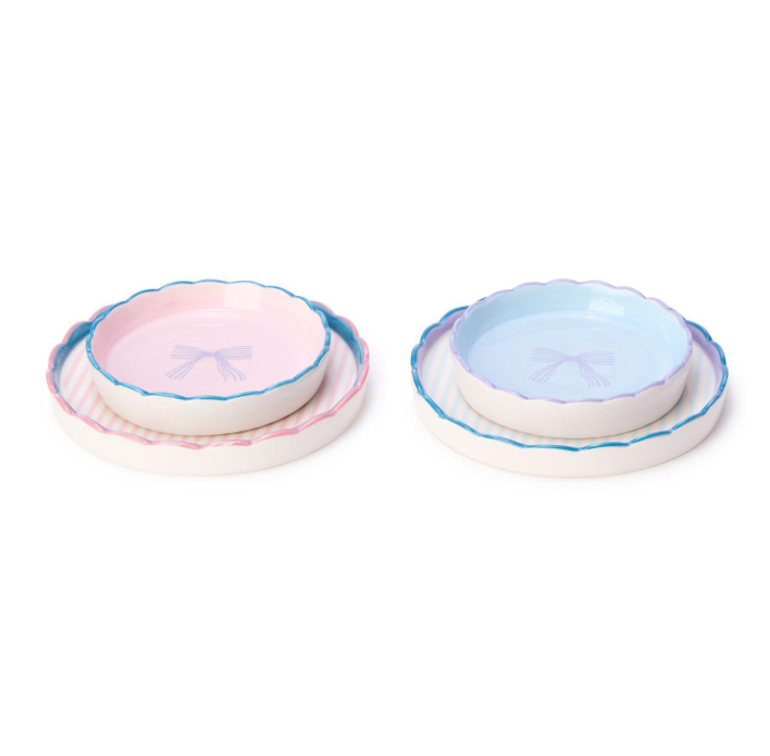 “Set of two scalloped edge stoneware trinket trays in pink and blue”