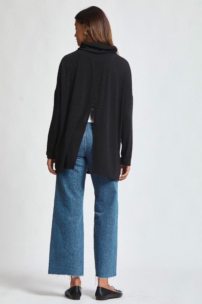 Dear Scarlett Destination Top in black featuring soft stretch knit, cowl neckline, and relaxed tunic fit.