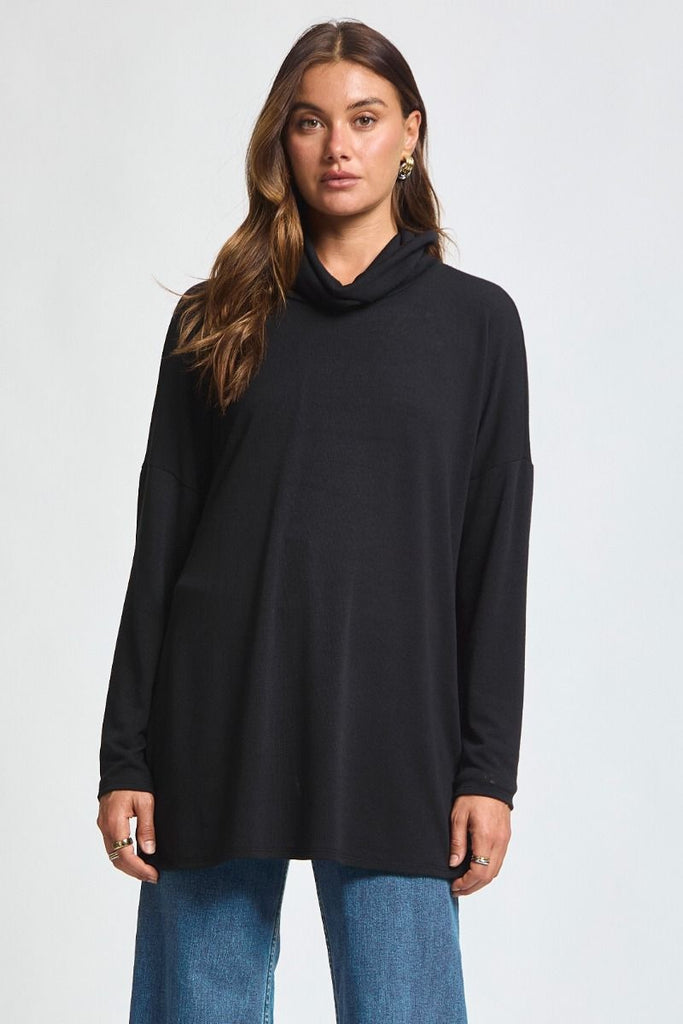 Dear Scarlett Destination Top in black featuring soft stretch knit, cowl neckline, and relaxed tunic fit.