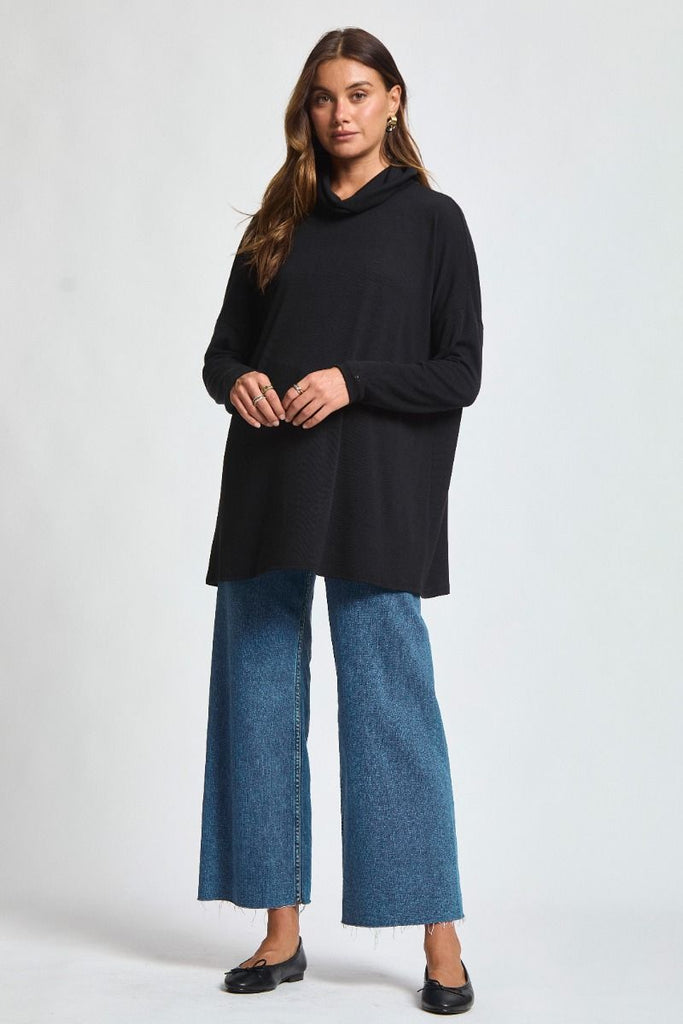 Dear Scarlett Destination Top in black featuring soft stretch knit, cowl neckline, and relaxed tunic fit.